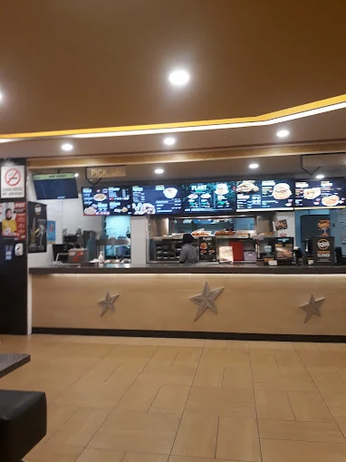 Counter and interior of Texas Chicken Raja Uda.