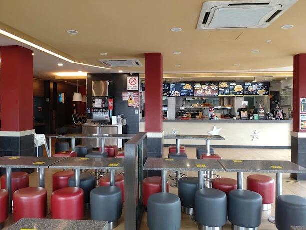 Dining area at Texas Chicken Raja Uda.