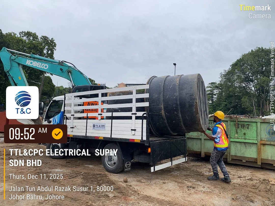 Cable drums and site equipment at the service-apartment works.